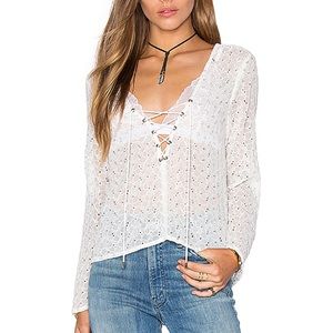 Revolve lace up top by Lucy Paris xs , white
